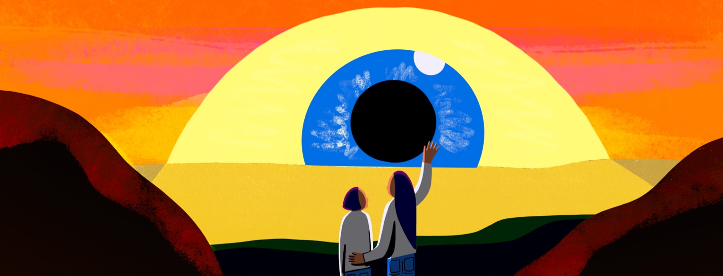 Two adult females watch a sunset eyeball, hand on back