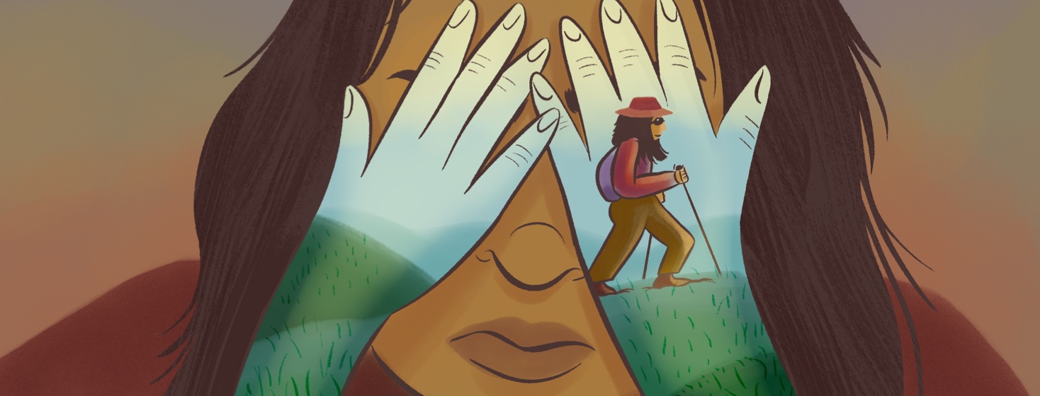 Close up of a woman covering her eyes to reveal hands that show the landscape of her confidently walking through mountains with hiking poles, sunglasses and a wide brim hat.